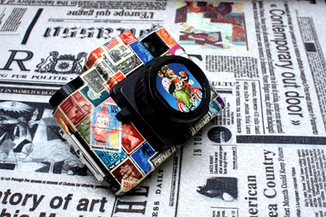 Customised using real stamps and covered with a layer of clear paint coating.